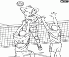 Aanval op het net en de verdediging proberen te blokkeren in een volleybal wedstrijd