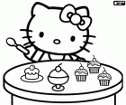 Hello Kitty met een lepel in zijn hand klaar om te eten wat heerlijke cakejes. Hello Kitty houdt van snoepjes, ze is zeer gulzig
