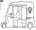 De Tuk Tuk is een middel voor personenvervoer vergelijkbaar met een collectieve taxi in de steden van India, het is een motorfiets met drie wielen met een eigenaardige carrosserie